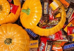 Pumpkins filled with assorted Halloween chocolate candy